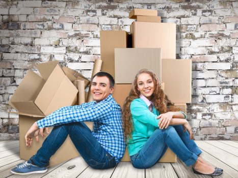 Household items being carefully loaded for a local move in South West London