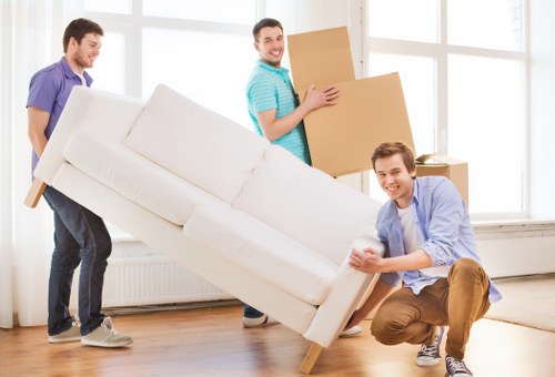 Local packing team handling fragile items and boxes