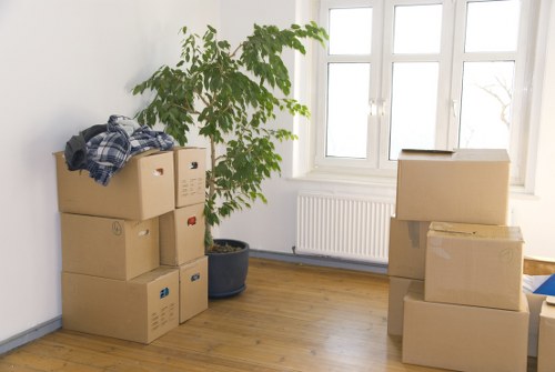 Packed office equipment and furniture ready for transport