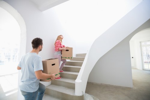 Careful loading of household items for a Merton Park relocation