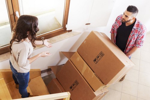 Careful handling of furniture during a home removal in Merton Park