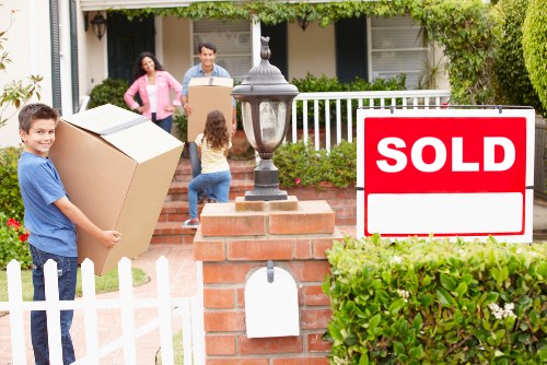 Prepared moving boxes and furniture for removal truck hire in Merton Park